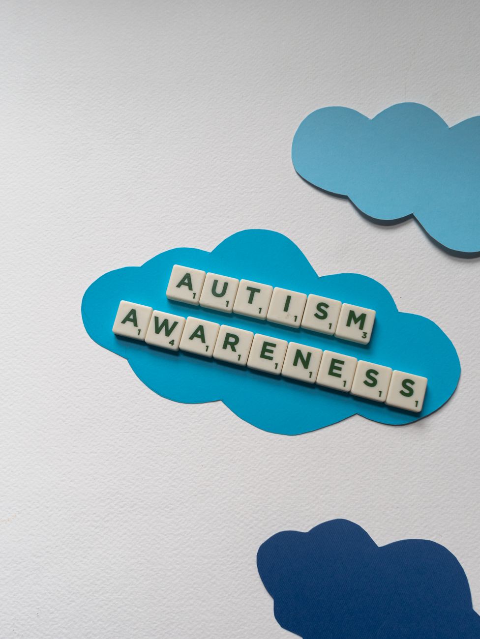 letter tiles on a cloud cutout